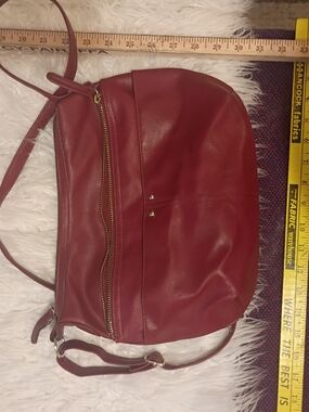 Sleek Red Crossbody Bag with Front Zip Pocket